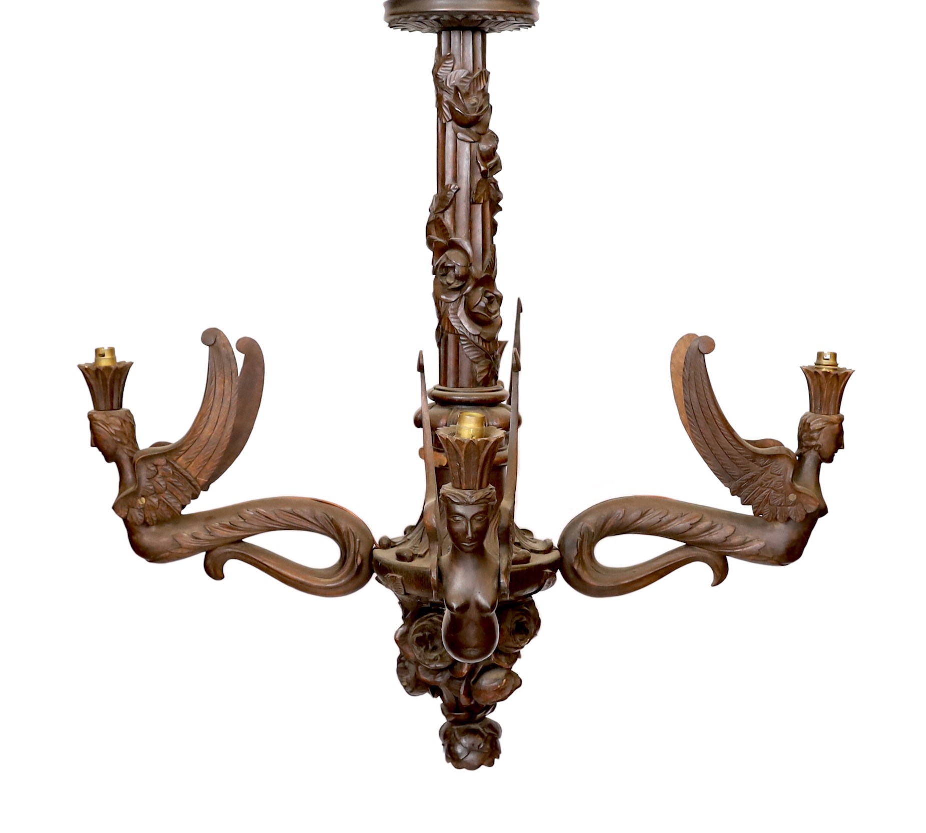 A Swiss Black Forest carved wood four light chandelier with caryatid branches and rose entwined stem, height 92cm. width 92cm